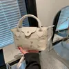 Bolso de Mano de Moda Tejido de Paja Estilo Coreano Suave Nuevo Verano 2026 Versátil Ins Bolso Cruzado Elegante Bolso Cuadrado Pequeño para Mujer