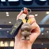 Liquidación de colección de llaveros colgantes de personajes de dibujos animados IP auténticos, lindos colgantes de estrella-luna-conejo para bolsos de niñas, stock para vendedores ambulantes