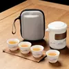 Porcelana de Jade Grasa de Oveja Paisaje Lavado con Tinta Set de Té de Viaje al Aire Libre Portátil Una Olla Cuatro Tazas Cerámica Taza Kuaike Tetera