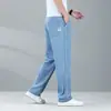 Calça Jeans Tencel Xintang Guangzhou para Homens, Novo Estilo Outono, Calça Reta Solta Azul Claro, Calça Masculina de Seda Gelada, Super Nova