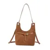 Bolso coreano de nicho para debajo del brazo de alta gama, lujo ligero, retro, bandolera única para mujer, nuevo estilo 2026, bolso tote para commuting