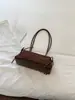 Bolso de hombro retro de nicho estilo francés para mujer, nuevo bolso de mano de alta calidad para el día a día, bolso versátil para llevar debajo del brazo