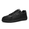 Zapatillas al por mayor transfronterizas, Zapatos versátiles de moda tendencia, Ligeros casuales de cuero suave de suela blanda, Zapatos de entrenamiento bajos alemanes, Zapatos blancos para estudiantes