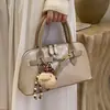Bolso Pequeño Retro de Gama Alta para Mujer 2026 Nuevo Super Popular Versátil Bolso Cruzado de Hombro a la Moda Bolso de Mano Tipo Concha