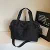 Bolsa de viaje para viajes cortos 2026 nuevo modelo bolso de mano de moda para mujer bolsa de equipaje de gran capacidad bolsa deportiva ligera para fitness para hombre