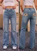Jeans boca de sino lavado retrô americano azul claro para mulheres com bolsos bordados florais na cintura traseira