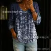 Nueva blusa de mujer de manga larga con botones y cuello en V estampada transfronteriza, elegante y estilosa para ir al trabajo, blusa casual única y a la moda