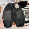 Pantalón vaquero de una pieza de forro polar para niño para otoño e invierno 2026, nuevos pantalones holgados de estilo coreano para niños, pantalones largos suaves para bebés y niños pequeños