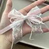 Encaje Dulce Perla Doble Cinta Hada Moño Accesorios Zapatos y Calcetines Bolsas Accesorios para Ropa Accesorios al por Mayor