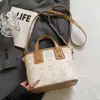 Bolso Canasta Tote Versátil Súper Popular Estilo Coreano para Mujer Modelo Nuevo 2026 Estilo Cotidiano Bolso Cubo Estampado Bolso de Hombro Cruzado