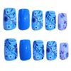 Manicura Simple Transfronteriza de 24 Piezas Europea y Americana Fresca Azul Flores Pequeñas y Hojas Rectangulares Medias Uñas Portátiles Venta al por Mayor