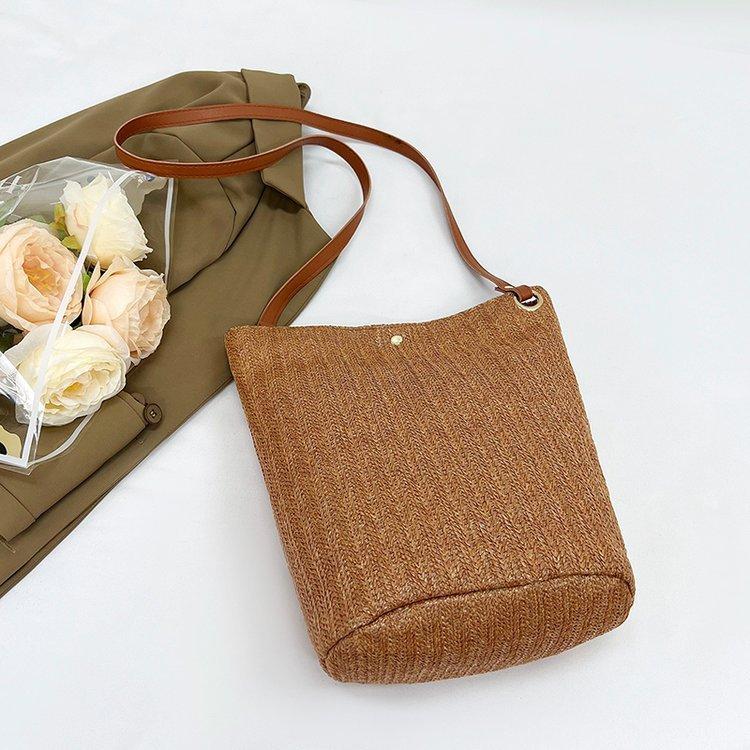 编织包女包新款潮2024夏草编简约百搭小清新水桶包个性单肩斜