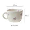 Taza y platillo de café de cerámica vintage de estilo japonés, amasados a mano, pintados a mano, con diseño floral irregular y platillo, platillo de postre de alto valor de color.