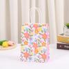 Bolsa de papel Kraft con estampado de flores bolsa de embalaje de flores coloridas estilo ins bolsa de regalo simple bolsa de embalaje pequeña fresca