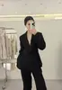 Traje de lana fina marca D mismo estilo para mujer cintura ceñida dobladillo de hoja con volantes otoño 2026 nuevo de alta gama profesional