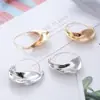Pendientes irregulares creativos de estilo europeo y americano, con forma de cesta de flores de metal, exagerados, con diseño de viento rojo, venta directa de fábrica.