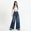 Jeans anchos vintage lavado 2026 para mujer, en negro y gris, con bajo amplio, estilo pata de elefante y bordes deshilachados