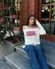 Amazon Wish Suéter Tricô Feminino Tendência Europeia e Americana Padrão Branco Solto Ombro a Ombro Versátil Top Atacado