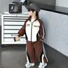 Conjunto de Bloques de Color y Rayas para Niños Primavera y Otoño Estilo Coreano Fresco Moderno Ropa Deportiva Conjunto de Dos Piezas Ropa para Niños Pequeños y Niños Pequeños