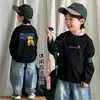 Camiseta de manga larga 100% algodón para niños, cuello redondo, corte holgado, camiseta básica elegante, estilo nuevo, versátil para primavera y otoño, camiseta de cuello redondo