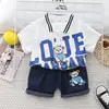Verão infantil nova camisa pólo de lapela de manga curta conjunto de duas peças 0-4 anos de idade meninos casual t-shirt shorts jeans conjunto