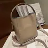 Cuero Genuino Piel de Vaca Curtida Vegetal Transfronterizo Nuevo Estilo Bolso Cubo Portátil Darong Hombro Viajero Bolso para Mujer Textura de Alta Calidad Bolso Cruzado