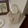 Bolsa de Mão Shuai Mi Home Cor Sólida Fashion Grande Capacidade Novo Estilo 2026 Simples Sensação Relaxada Estilo Cesta Tendência Bolsa de Ombro