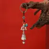Chaveiro de liga metálica em dois tons estilo Xizang com sino vajra e pingente de mantra de seis caracteres, adequado para pendurar no carro e na bolsa, acessório decorativo criativo de uso duplo