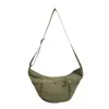 Bolso de mano coreano de nicho transfronterizo tipo bolsa de dumplings para mujer 2026 Otoño nuevo bolso de hombro literario simple bolso cruzado para ir al trabajo