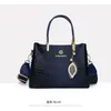 Bolso de Maternidad de Moda Simple con Sentido Avanzado Nuevo Bolso de Hombro Cruzado Versátil Diseño de Nicho Bolso de Mujer de PU