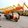 Grúa de Tres Ruedas Wuzheng de 5 Toneladas Pequeña para Uso Doméstico Piso Jardín Construcción de Ingeniería Grúa de Tres Ruedas Grúa