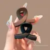 Pinza para el cabello de tamaño mediano de lunares blancos y negros estilo francés, diseñada para la parte trasera de la cabeza, un accesorio para el cabello nuevo y elegante con un aspecto sofisticado y con estilo