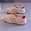 Tênis de treino feminino alemão 2026 novo outono sola grossa sola macia cadarço casual versátil esportivo sapatos brancos K1529