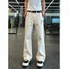 Venta al por mayor de fabricante, jeans bordados de corte inclinado estilo americano, lavado vintage, vibra cool y atrevida, pantalones de pierna curva, pantalones rectos adelgazantes