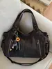 Bolso Tote de Gran Capacidad de Nicho para Mujer 2026 Nuevo Vintage para Viajes Diarios Bajo el Brazo Bolsa para Motociclista con Múltiples Bolsillos Bolso de Hombro Único Cruzado