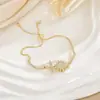 Pulseira Rotativa Transfronteiriça para Mulheres, Pulseira de Luxo Leve da Moda com Zircônia Microcravejada, Acessórios de Joias em Aço Titânio Banhado a Ouro Cobre Não Desbota