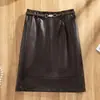 Falda de cuero PU estilo vintage para mujer, nueva colección de otoño, elegante y estilizada, falda de línea A con cinturón