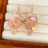 Aretes de aguja plateada con diamantes y circonitas, aretes de borla de cristal, pequeños accesorios frescos para vacaciones, aretes de lujo ligero de alta gama al por mayor