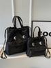 Bolso de lona de gran capacidad para mujer 2024 Nueva Moda bolso casual de hombro con cordón bolso de cubo mochila versátil bolso de viaje