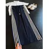 Calça Esportiva Casual Limpa Versátil de Secagem Rápida com Três Listras Estilo Retro Americano para Homens, Corte Reto Solto, Verão 2026