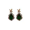 Pendientes de Flor de Zirconia Esmeralda Retro Aguja de Plata Calabaza Gota de Agua Lujo Ligero Nicho Temperamento Pendientes de Gama Alta para Mujer