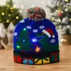 Decoraciones navideñas transfronterizas con pompón con bola sombrero navideño de punto luminoso sombrero con lámpara LED sombrero de alta calidad para adultos y niños