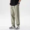 Pantalones color blanco roto para hombre, pierna recta holgada, modernos, versátiles, finos de verano, transpirables, pantalones largos casuales, elásticos, cónicos, talla grande