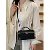 Bolso retro súper popular de patrón de lichi para mujer, nuevo bolso cruzado versátil de moda 2026, bolso pequeño cuadrado tipo caja de mano