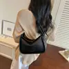 Bolso retro tipo axila coreano para mujer, nuevo modelo de verano 2026, simple y de nicho, bolso cuadrado pequeño de un solo hombro de alta apariencia para mujer