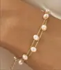 Colar de Trevo de Quatro Folhas com Zircônia Novo Estilo Europeu e Americano para Mulheres, Colar de Flor de Pérola e Concha Atacado, Pulseira de Borboleta com Contas Douradas Atacado