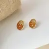 Oferta Especial Brinco Laranja Mar Sea Estilo Chanel Nicho Alto Padrão Início da Primavera Brinco de Tarraxa com Cristal Cor Champagne 2023 Novo Modelo