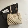 Bolso de mano tipo tote de lunares simple y casual para mujer, nuevo bolso versátil de alta gama para llevar bajo el brazo, bolso de mano de pana, bolso de hombro para ir al trabajo