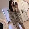 Bestseller transfronterizo de verano: bufanda de gasa para mujer con estampado de cadena, chal elegante de alta gama para protección solar en la playa, versátil