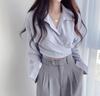 Camisa corta de un solo pecho con cordones y aspecto elegante que adelgaza la cintura, estilo retro, reductor de edad, estilo coreano chic para primavera y otoño.